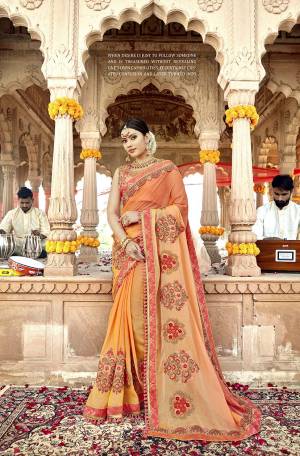 Adorn The Pretty Angelic Look In This Lovely Heavy Designer Red Colored Saree. This Saree Is Fabricated On Satin Georgette Paired With Art Silk Blouse, It Is Beautified With Attractive Detailed Embroidery. 