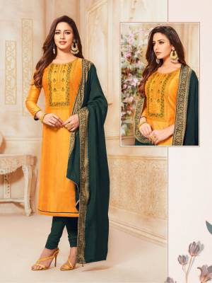 For Your Semi-Casual Wear, Grab This Lovely Straight Suit In Musturd Yellow Color Paired With Dark Grey Colored Bottom And Dupatta. Its Top Is Fabricated On South Cotton Paired With Cotton Bottom And Jacquard Silk Fabricated Dupatta. Buy Now.