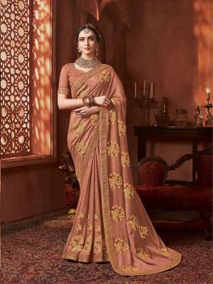 Get Ready For The Upcoming Wedding And Festive Season With This Designer Saree In Light Brown Color. This Tone To Tone Embroidered Saree Is Fabricated On Vichitra Silk Paired With Art Silk Fabricated Blouse.