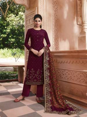 Here Is A Very Pretty Designer Straight Suit In Wine Color. Its Stone Embroidered Top Is Fabricated On Crepe Paired With Crepe Bottom And Jacquard Silk Fabricated Dupatta. Buy This Pretty Suit Now.