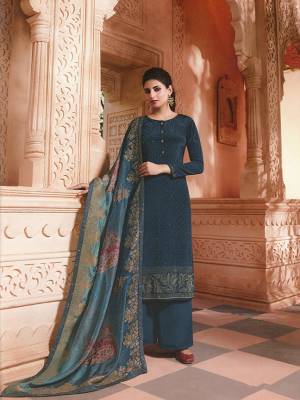 Enhance Your Personality Wearing This Rich And Elegant Looking Straight Suit In Dark Grey Color. Its Top And Bottom Are Fabricated On Crepe Paired With Jacquard Silk Fabricated Dupatta. Buy Now.