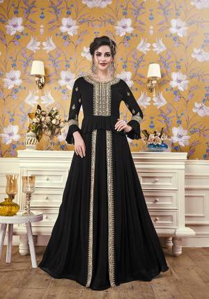Here Is A New And Unique Patterned Designer Readymade Gown In Black Color. This Pretty Gown Is Fabricated On Georgette Beautiufied With Attractive Detailed Embroidery. You Will Definitely Earn Lots Of Compliments In This Lovely Puplum Patterned Designer Gown. 