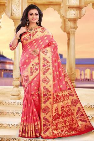 Celebrate This Festive Season With Beauty And Comfort Wearing This Pretty Silk Based Saree In Dark Peach Color Paired With Dark Peach Colored Blouse. This Saree And Blouse Are Fabricated On Art Silk Beautified With Weave.