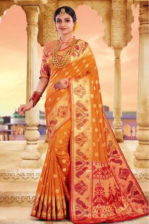 Adorn A Rich Look Wearing This Designer Saree In Musturd Yellow Color Paired With Contrasting Peach Colored Blouse. This Saree and Blouse Are Fabricated On Art Silk Beautified With Attractive Weave. Buy Now