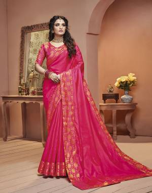 Grab This Pretty Attractive Saree In Rani Pink Color Paired With Rani Pink Colored Blouse. This Saree Is Fabricated On Satin Silk Paired With Brocade Fabricated Blouse. Its Rich Fabric And Color Will Earn You Lots Of Compliments From Onlookers.