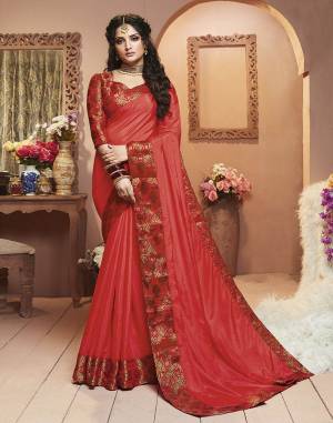 Grab This Pretty Attractive Saree In Red Color Paired With Red Colored Blouse. This Saree Is Fabricated On Satin Silk Paired With Brocade Fabricated Blouse. Its Rich Fabric And Color Will Earn You Lots Of Compliments From Onlookers.