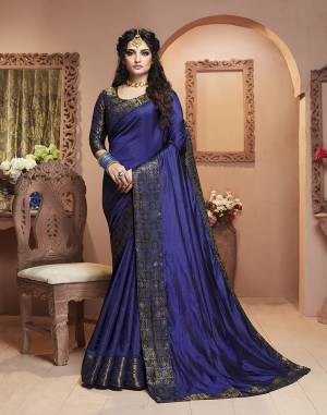 Grab This Pretty Attractive Saree In Royal Blue Color Paired With Royal Blue Colored Blouse. This Saree Is Fabricated On Satin Silk Paired With Brocade Fabricated Blouse. Its Rich Fabric And Color Will Earn You Lots Of Compliments From Onlookers.