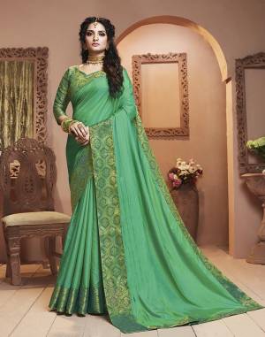 Grab This Pretty Attractive Saree In Sea Green Color Paired With Sea Green Colored Blouse. This Saree Is Fabricated On Satin Silk Paired With Brocade Fabricated Blouse. Its Rich Fabric And Color Will Earn You Lots Of Compliments From Onlookers.