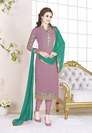 Add This Beautiful Designer Straight Suit To Your Wardrobe In Dusty Pink Color Paired With Sea Green Colored Dupatta. Its Top Is Fabricated On Georgette Paired With Santoon Bottom And Chiffon Dupatta. Its Fabric Is Light In Weight And Easy To Carry All Day Long