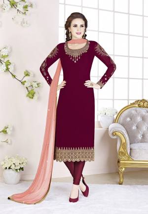 Celebrate This Festive Season With Beauty And Comfort Wearing This Designer Straight Suit In Maroon Color Paired With Peach Colored Dupatta. Its Top Is Fabricated on Georgette Paired With Santoon Bottom And Chiffon Fabricated Dupatta. All Its Fabrics Are Light Weight And Ensures Superb Comfort All Day Long.