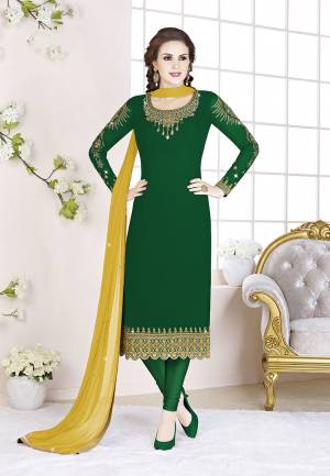 Add This Beautiful Designer Straight Suit To Your Wardrobe In Dark Green Color Paired With Yellow Colored Dupatta. Its Top Is Fabricated On Georgette Paired With Santoon Bottom And Chiffon Dupatta. Its Fabric Is Light In Weight And Easy To Carry All Day Long