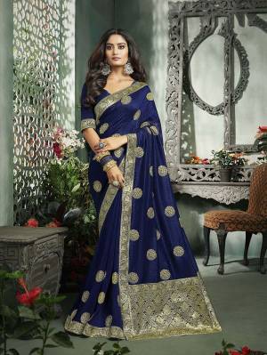 You Will Definitely Earn Lots Of Compliments Wearing This Rich Designer Saree In Royal blue Color. This Saree And Blouse Are Silk Based Beautified With Jari Embroidery and Weaved Border. Buy This Saree Now.