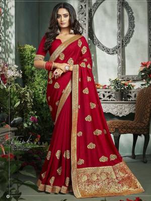Flaunt Your Rich And Elegant Taste In This Pretty Red Colored Saree. This Saree And Blouse Are Fabricated On Art Silk Beautified With Broad Weaved Lace Border And Jari Embroidered Motifs. 