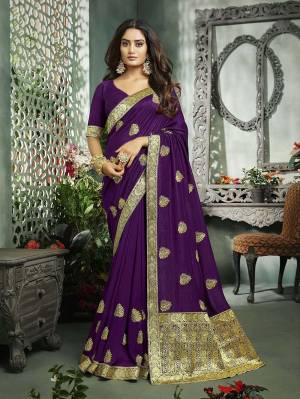 Flaunt Your Rich And Elegant Taste In This Pretty Purple Colored Saree. This Saree And Blouse Are Fabricated On Art Silk Beautified With Broad Weaved Lace Border And Jari Embroidered Motifs. 