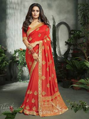 You Will Definitely Earn Lots Of Compliments Wearing This Rich Designer Saree In Orange Color. This Saree And Blouse Are Silk Based Beautified With Jari Embroidery and Weaved Border. Buy This Saree Now.