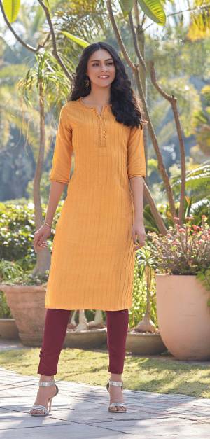 Here Is A Pretty Simple And Elegant Straight Kurti In Musturd Yellow Color For Your Casual Or Semi-Casual Wear. It Is Fabricated On South Cotton And You Can Pair This Up With Leggings, Plazzo Or Pants. This Readymade Kurti Is Available In All Regular Sizes. 