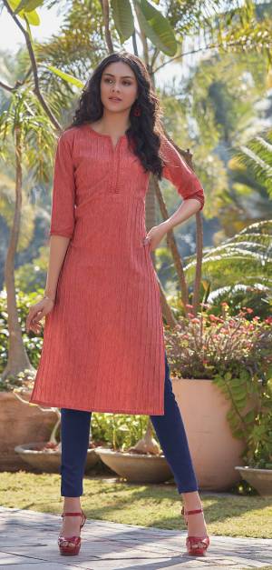 Here Is A Pretty Simple And Elegant Straight Kurti In  Dark Peach Color For Your Casual Or Semi-Casual Wear. It Is Fabricated On South Cotton And You Can Pair This Up With Leggings, Plazzo Or Pants. This Readymade Kurti Is Available In All Regular Sizes. 