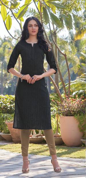 Here Is A Pretty Simple And Elegant Straight Kurti In Black Color For Your Casual Or Semi-Casual Wear. It Is Fabricated On South Cotton And You Can Pair This Up With Leggings, Plazzo Or Pants. This Readymade Kurti Is Available In All Regular Sizes. 