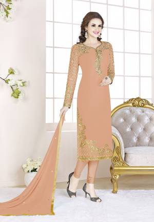 Add This Beautiful Designer Straight Suit To Your Wardrobe In All Over Peach Color. Its Top Is Fabricated On Georgette Paired With Santoon Bottom And Chiffon Dupatta. Its Fabric Is Light In Weight And Easy To Carry All Day Long.