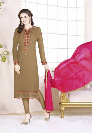 Celebrate This Festive Season With Beauty And Comfort Wearing This Designer Straight Suit In Brown Color Paired With Dark Pink Colored Dupatta. Its Top Is Fabricated on Georgette Paired With Santoon Bottom And Chiffon Fabricated Dupatta. All Its Fabrics Are Light Weight And Ensures Superb Comfort All Day Long.