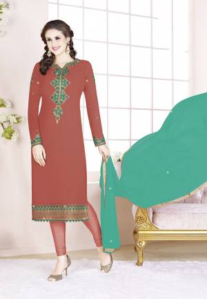 Celebrate This Festive Season With Beauty And Comfort Wearing This Designer Straight Suit In Rust Color Paired With Sea Green Colored Dupatta. Its Top Is Fabricated on Georgette Paired With Santoon Bottom And Chiffon Fabricated Dupatta. All Its Fabrics Are Light Weight And Ensures Superb Comfort All Day Long.