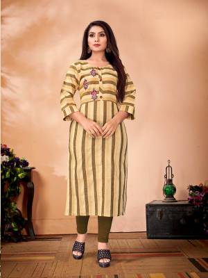 Here Is A Very Pretty Designer Readymade Kurti In Beige Color Fabricated On Cotton. It Is Beautified With Striped Prints And Thread Work. 