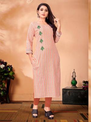 For Your Semi-Casual Wear, Grab This Designer Readymade Straight Kurti In Orange And White Color Fabricated On Cotton. It Has Striped Prints With Pretty Embroidered Thread Work.