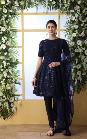 Enhance Your Personality Wearing This Designer Suit In All Over Navy Blue Color. Its Top Is Fabricated On Georgette Paired With Santoon Bottom And Net Fabricated Dupatta. Buy This Suit Now.