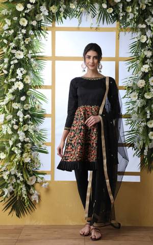 For A Bold And Beautiful Look, Grab This Designer Suit In Black Color With Multi Colored Embroidery Work. Its Top Is Fabricated On Art Silk Paired With Santoon Bottom And Net Fabricated Dupatta. 