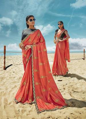 Celebrate This Festive Season Wearing This Designner Saree In Dark Peach Color Paired With Contrasting Grey Colored Blouse. This Saree And Blouse Are Silk Based Beautified With Detailed Embroidery. Buy Now.