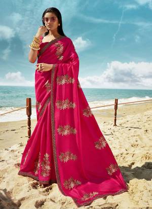 Celebrate This Festive Season Wearing This Designner Saree In Rani Pink Color. This Saree And Blouse Are Silk Based Beautified With Detailed Embroidery. Buy Now.
