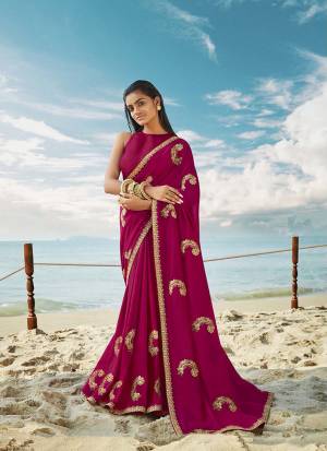 Celebrate This Festive Season Wearing This Designner Saree In Magenta Pink Color. This Saree And Blouse Are Silk Based Beautified With Detailed Embroidery. Buy Now.