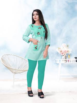 Here Is A Readymade Short Kurti For Your Casual Wear In Sky Blue Color. This Pretty Kurti Is Fabricated On Cotton Beautified With Thread Work. It Is Light Weight And Ensures Superb Comfort All Day Long. 