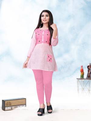 Here Is A Readymade Short Kurti For Your Casual Wear In Pink Color. This Pretty Kurti Is Fabricated On Cotton Beautified With Thread Work. It Is Light Weight And Ensures Superb Comfort All Day Long. 