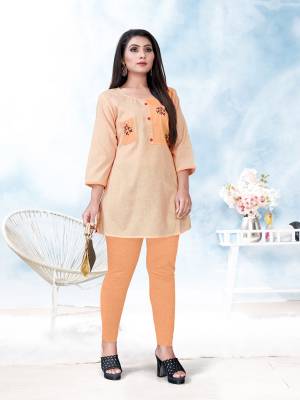 Here Is A Readymade Short Kurti For Your Casual Wear In Orange Color. This Pretty Kurti Is Fabricated On Cotton Beautified With Thread Work. It Is Light Weight And Ensures Superb Comfort All Day Long. 
