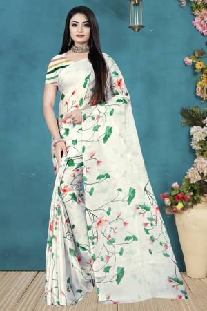 Here Is A Very Pretty Printed Saree For Your Semi-Casuals As Well As Festive Wear. This Lovely Saree And Blouse Are Fabricated On Satin Silk Beautified With Digital Prints. Also Its Fabric Is Soft Towards Skin And Easy To Carry All Day Long. 