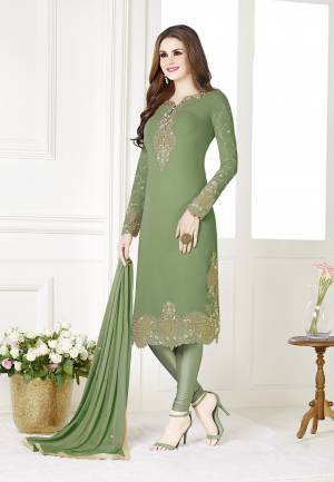 Add This Beautiful Designer Straight Suit To Your Wardrobe In Light Green Color. Its Top Is Fabricated On Georgette Paired With Santoon Bottom And Chiffon Dupatta. Its Fabric Is Light In Weight And Easy To Carry All Day Long