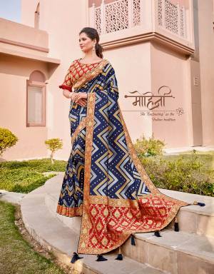 Look enchanting as the Indian traditions in this chevron-weaved saree in the royal color -blue with a detailed and appealing short pallu. Pair with statement jewels for an ethereal appeal. 