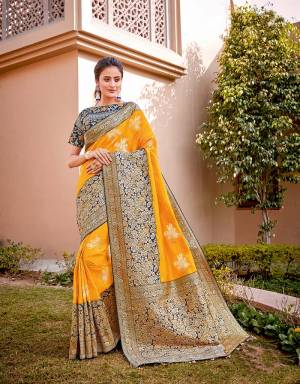 A tasteful combination of auspicious yellow and ornate floral weaves , this saree is for every woman rooted to the culture and heritage. Wear it in a free-falling pallu style to look regal. 