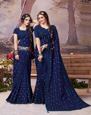 Enhance Your Personality Wearing This Designer Elegant Looking Saree In Navy Blue Color. This Pretty Saree And Blouse Are Silk Based Beautified With Pretty Intricate Embroidered Butti. Also Its Rich Fabric And Color Will Earn You Lots Of Compliments From Onlookers. 