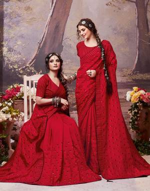 Here Is A Very Pretty Designer Saree In Red Color For The Upcoming Festive Season. This Saree Is Fabricated On Soft Art Silk Paired With Art Silk Fabricated Blouse. It Is Beautified With Embroidered Buttis All Over. Buy Now.