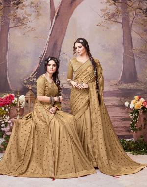 Enhance Your Personality Wearing This Designer Elegant Looking Saree In Beige Color. This Pretty Saree And Blouse Are Silk Based Beautified With Pretty Intricate Embroidered Butti. Also Its Rich Fabric And Color Will Earn You Lots Of Compliments From Onlookers. 