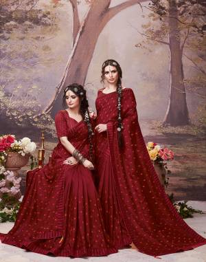 Enhance Your Personality Wearing This Designer Elegant Looking Saree In Maroon Color. This Pretty Saree And Blouse Are Silk Based Beautified With Pretty Intricate Embroidered Butti. Also Its Rich Fabric And Color Will Earn You Lots Of Compliments From Onlookers. 