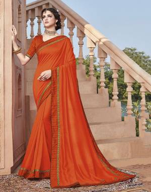 This Festive Season, Look The Most Elegant And Confident Of all Wearing This Designer Jari Embroidered Saree In Orange Highlighted With Thread Work, Also It Is Silk Based Which Gives A Rich Look To Your Personality.?