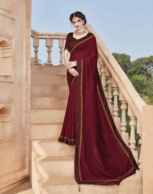 This Festive Season, Look The Most Elegant And Confident Of all Wearing This Designer Jari Embroidered Saree In Maroon Highlighted With Thread Work, Also It Is Silk Based Which Gives A Rich Look To Your Personality.?