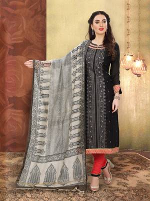 Add This Lovely Rich And Elegant Looking Silk Based Designer Straight Suit To Your Wardrobe In Black Color. Its Top Is Fabricated On Chanderi Silk Paired With Cotton Based Bottom And Art Silk Dupatta.