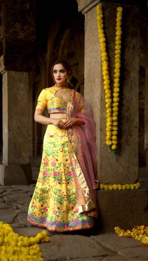 Rich And Elegant Looking Digital Printed Designer Lehenga Choli Is Here In Yellow & Pink Color. This Pretty Lehenga Choli Is Satin Based Paired With Net Fabricated Dupatta. Its abric Is Soft Towards Skin And Easy To Carry Throughout The Gala. 