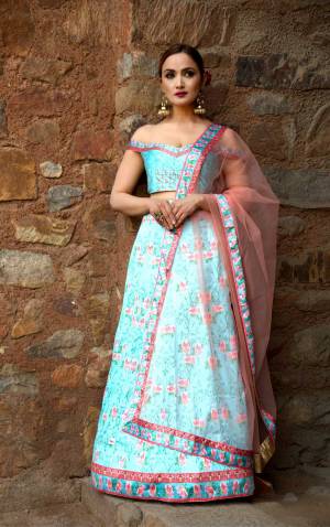 Look Pretty In This Designer Blue & Dusty Pink Colored Lehenga Choli. Its Lovely Digital Printed Blouse And Lehenga Are Satin Based Paired With Red Fabricated Dupatta. Buy This Pretty Piece Now.