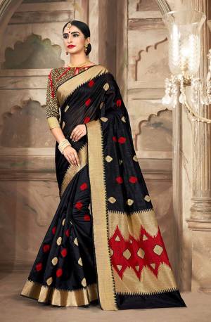 Flaunt Your Rich and Elegant Taste Wearing This Pretty Saree In Black?Color Paired With Black & Golden Colored Blouse. This Saree And Blouse Are Fabricated on Cotton Handloom Gives A Rich Look To Your Personality.