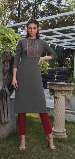 Grab This Readymade Straight Kurti In Grey Color Fabricated On Rayon. It Is Beautified With Pretty Elegant Minimal Thread Embroidery. You Can Pair This Up With Same Or Contrasting Colored Leggings Or Pants. 